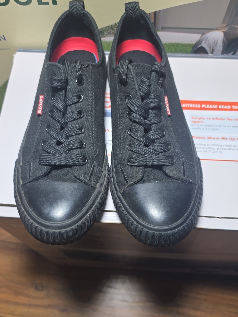 Levi's Black Low-Top Canvas Sneakers with Red Accents